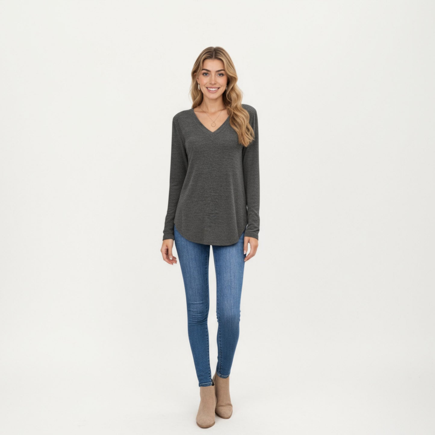 Long Sleeve V-Neck Knit Top with Curved Hem and Relaxed Fit