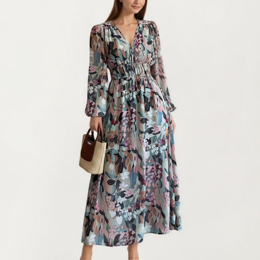 Long Sleeve Maxi Dress with V-Neckline, Ruched Elastic Waist Detail, and Flowing Sheer Overlay Featuring an Allover Floral Pattern