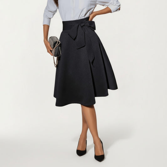 Flared Midi Skirt with Structured High Waist and Oversized Bow Detail Creating a Smooth Draped Silhouette