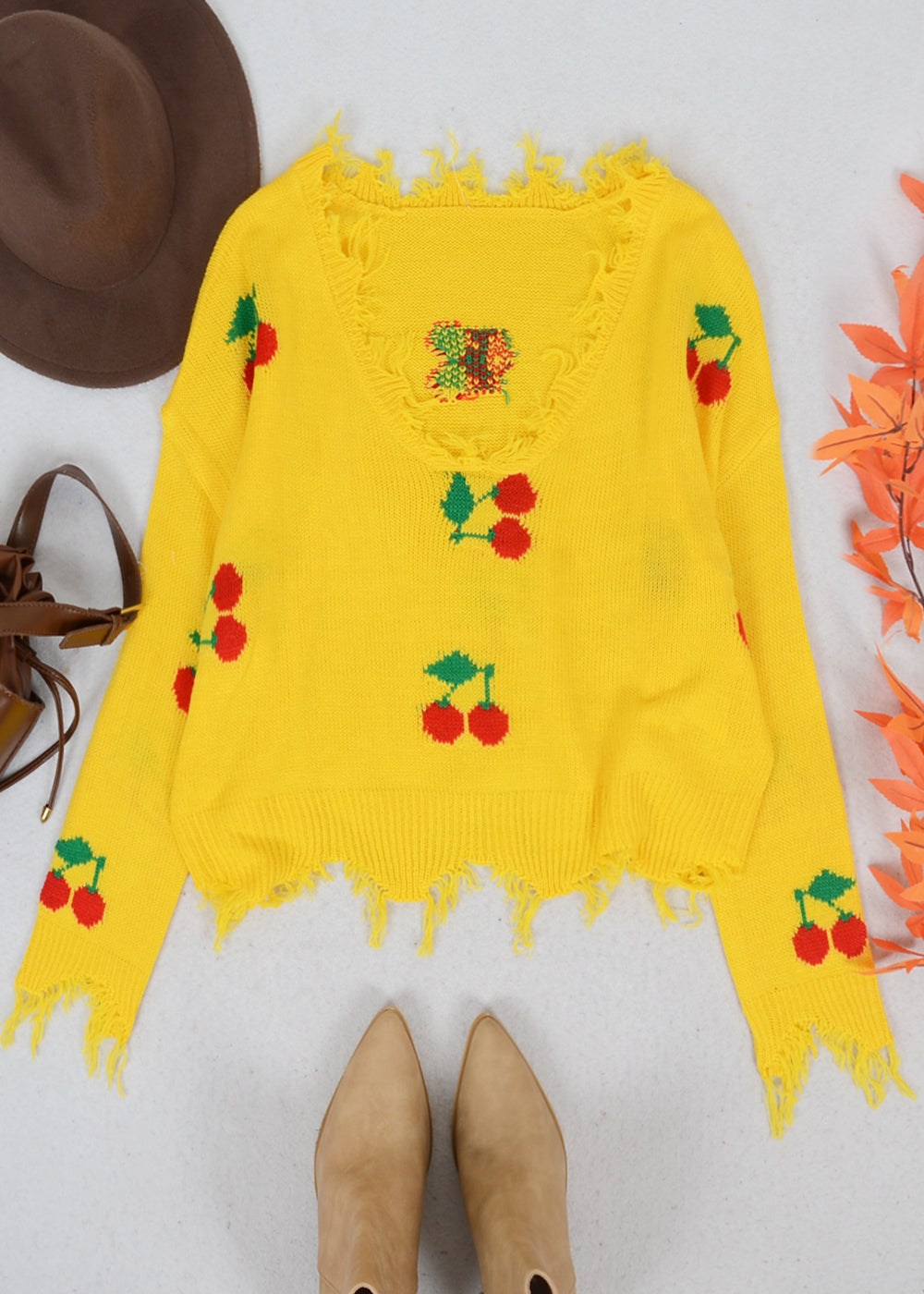 Tassel Frayed Hem Patterned Sweater