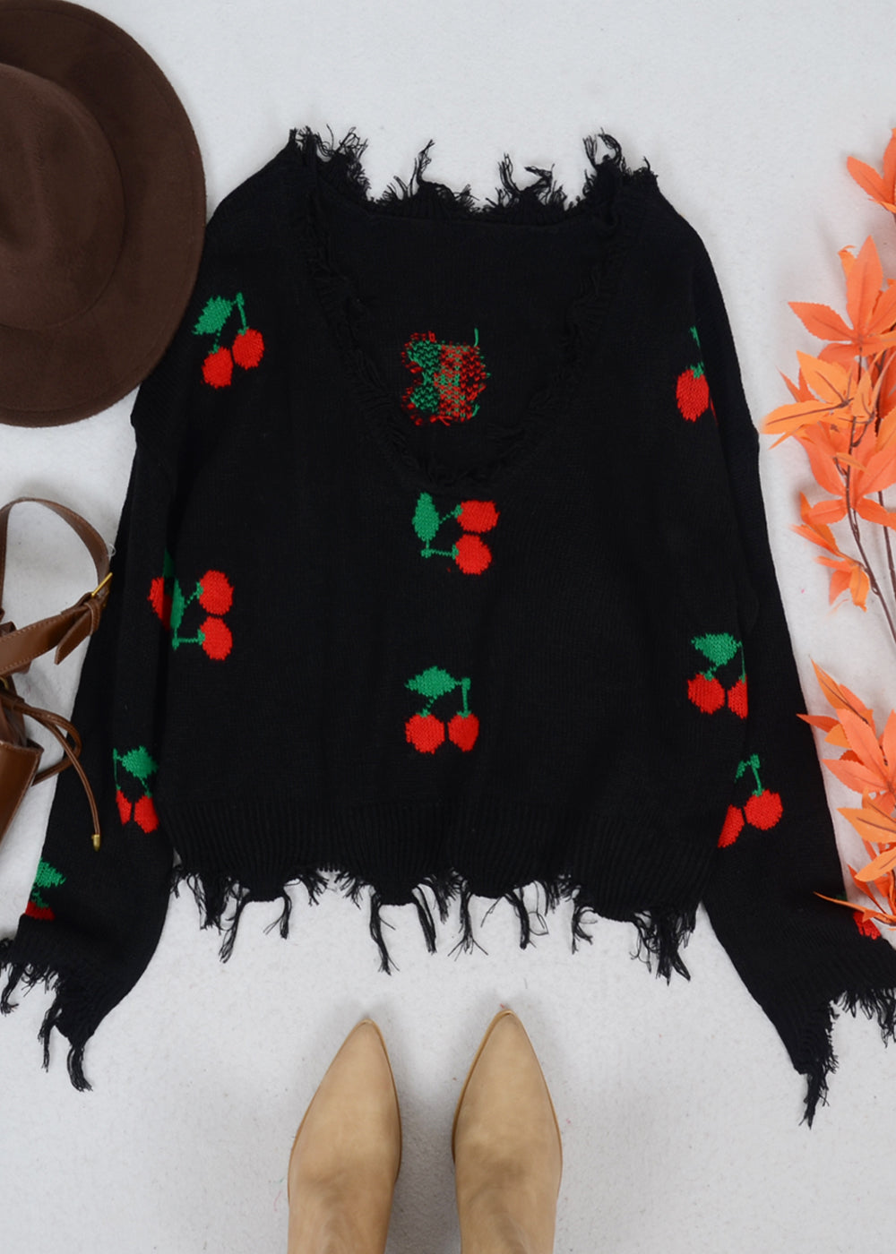 Tassel Frayed Hem Patterned Sweater