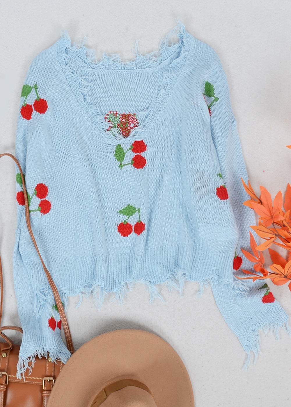 Tassel Frayed Hem Patterned Sweater