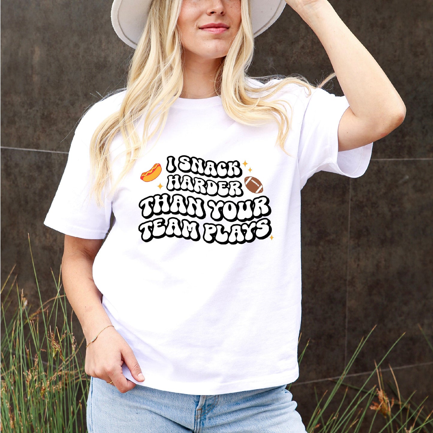 American Football Trendsetter Tee: "I Snack Harder Than Your Team Plays" In Black