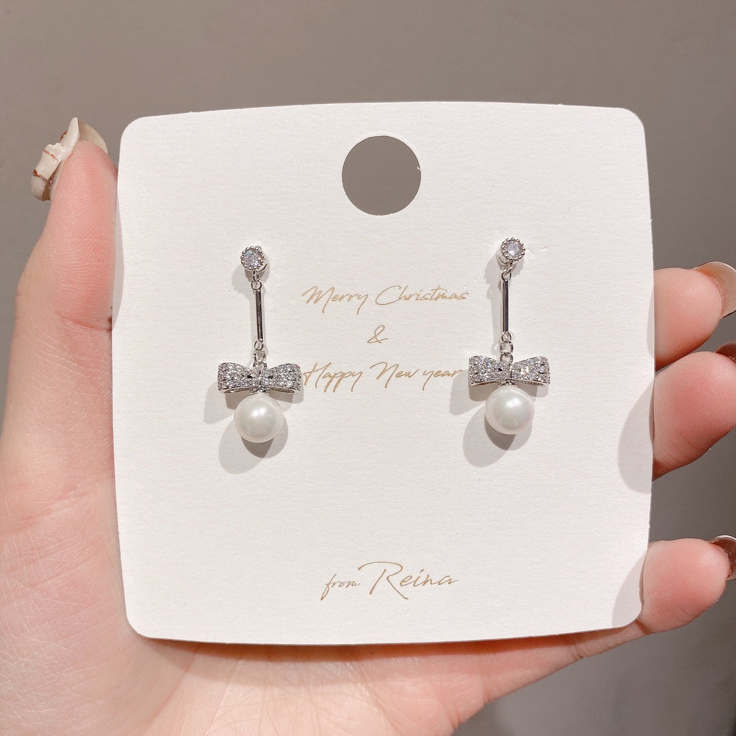 Pearl and Bow Silver Dangle Earring