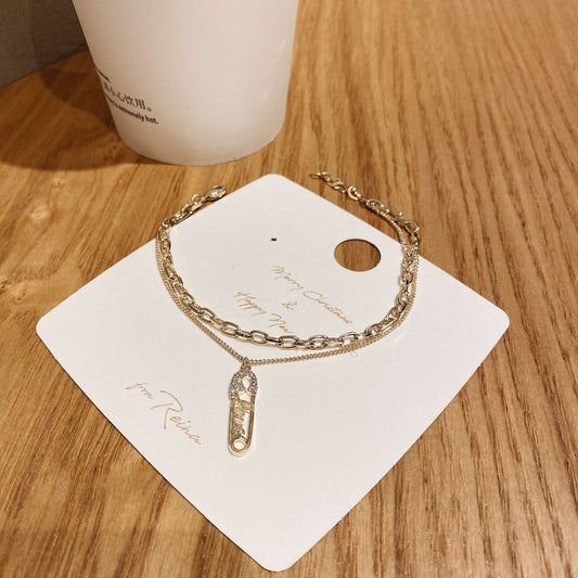 Double Layered Gold Chain Bracelet with Safety Pin Charm