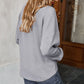 Long Sleeve Waffle Knit Pullover Top with Shoulder Button Detail and Front Tie Hem