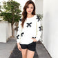 Women's Knit Sweater with Black Bow Pattern Long Sleeves