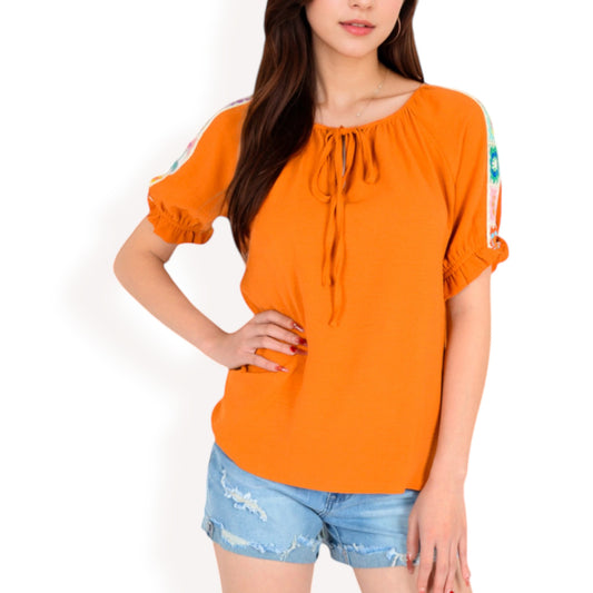 Short Sleeve Peasant Top with Embroidered Shoulder Details and Tie Neck