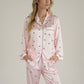 Lounge Women's Satin Long Sleeve Pajama Set with Mini Bow Print Button-Up Top and Chest Pocket