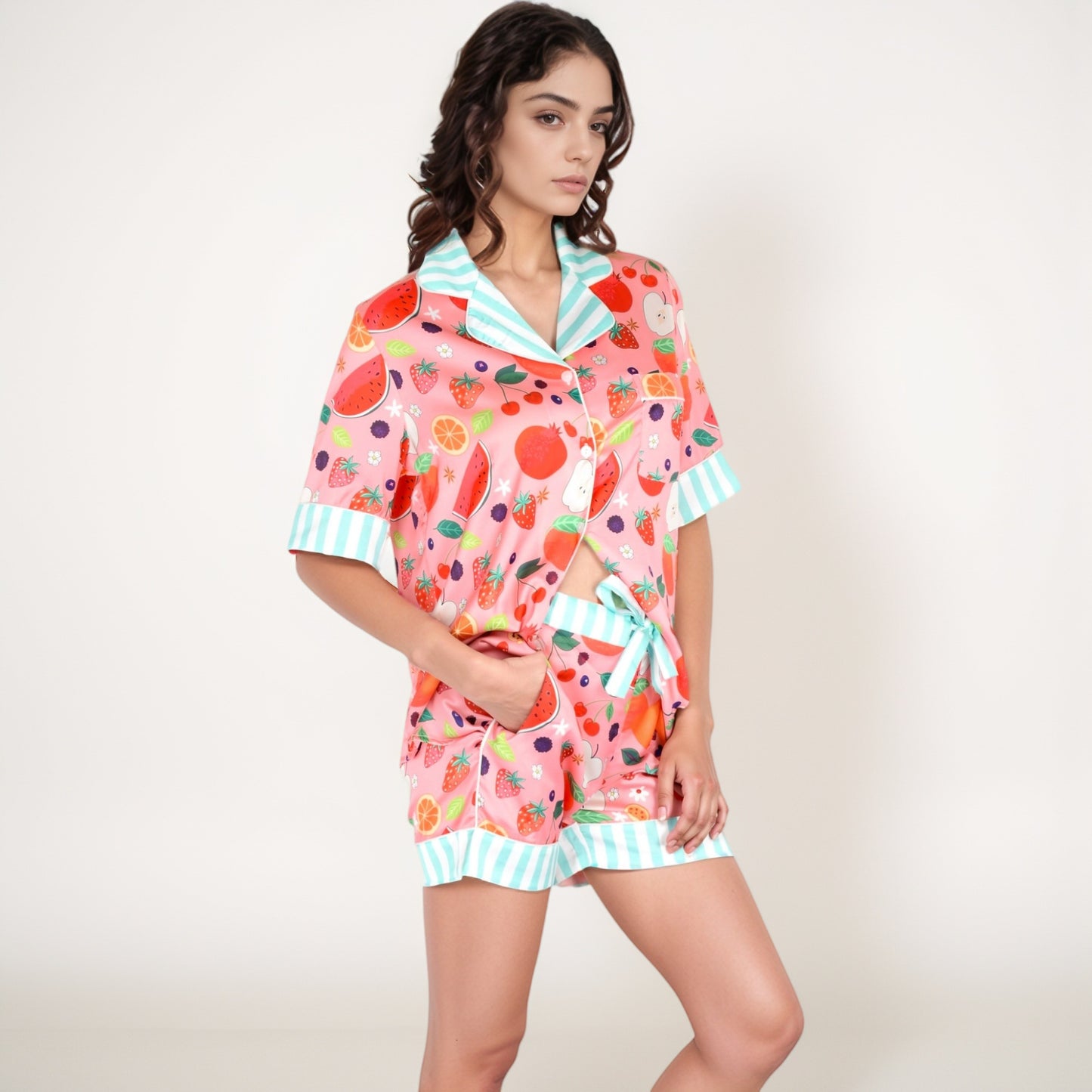 Colorful Fruit Print Pajama Set with Short Sleeve Button-Up Top and Striped Trim Shorts