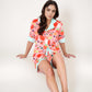 Colorful Fruit Print Pajama Set with Short Sleeve Button-Up Top and Striped Trim Shorts