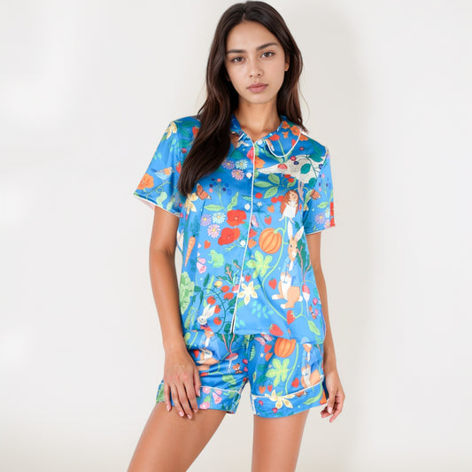 Whimsical Garden Animal Print Pajama Set with Short Sleeve Button-Up Top and Matching Shorts