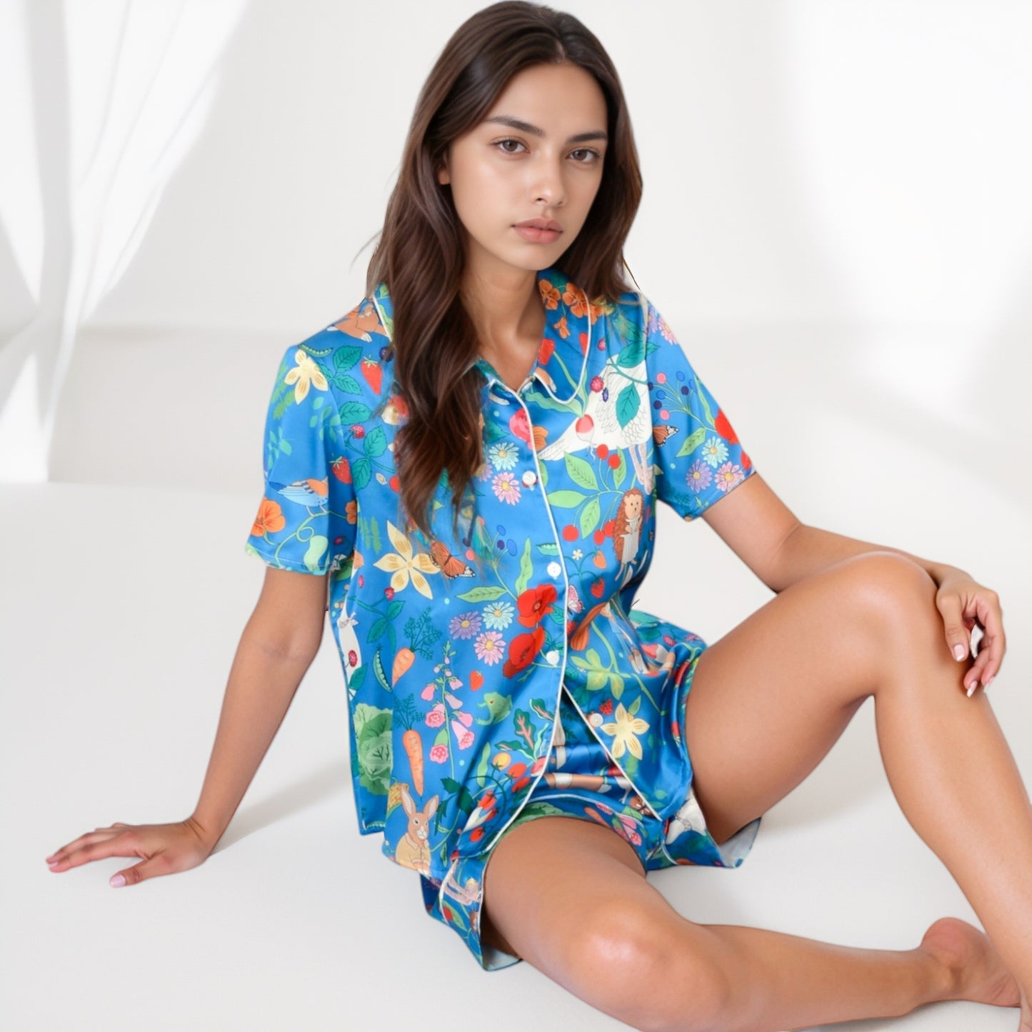 Whimsical Garden Animal Print Pajama Set with Short Sleeve Button-Up Top and Matching Shorts