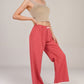 Red Checkered Lounge Pants with Elastic Waistband White Bow Tie Detail and Relaxed Full-Length Wide Leg Fit