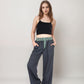 Red Vertical Stripe Wide Leg Pants with Smocked Waistband Contrast Plaid Detail and Relaxed Full-Length Fit