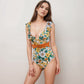 Swim Women's Ruffle Trim One Piece Swimsuit with Deep V Neckline and Decorative Belt Detail