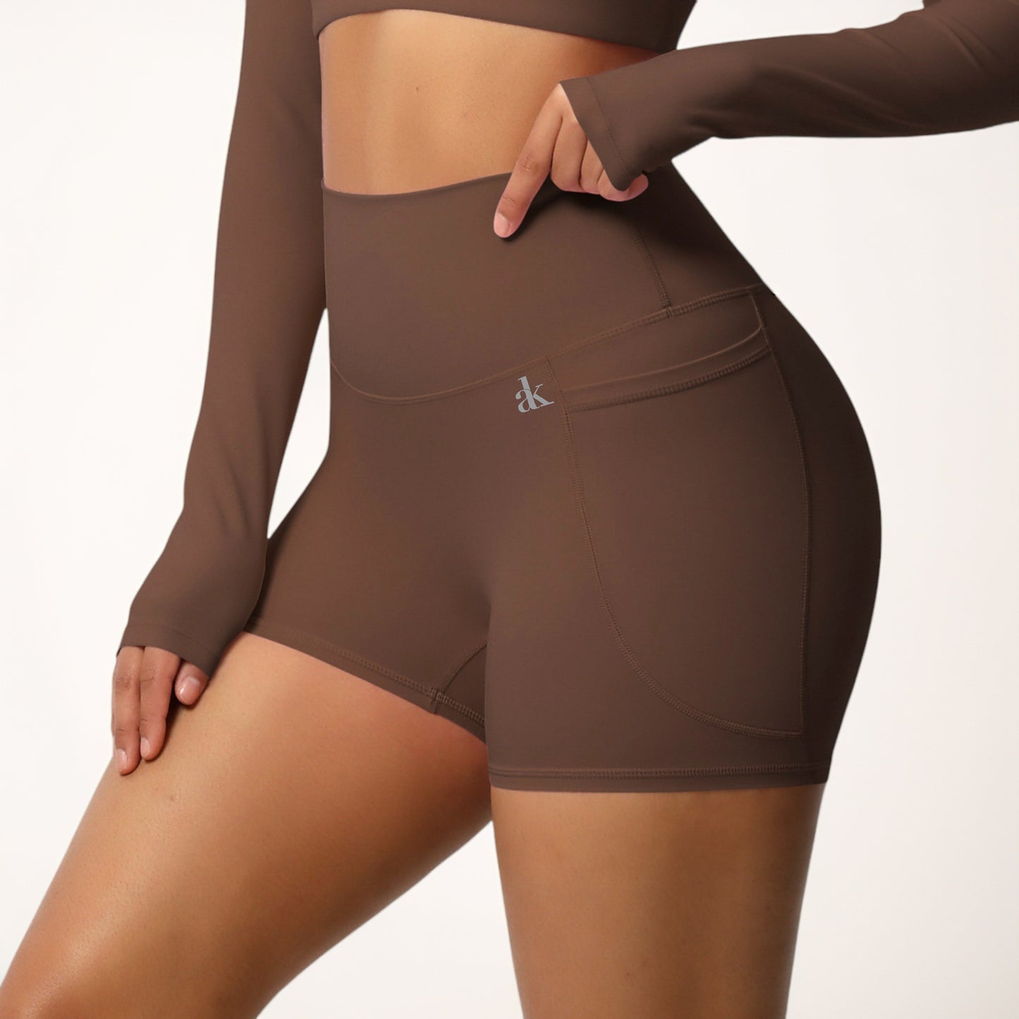 High Waist Active Shorts with Stretch Compression Fit Seamless Construction and Side Pocket Detail