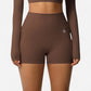 High Waist Active Shorts with Stretch Compression Fit Seamless Construction and Side Pocket Detail