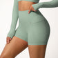 High Waist Active Shorts with Stretch Compression Fit Seamless Construction and Side Pocket Detail