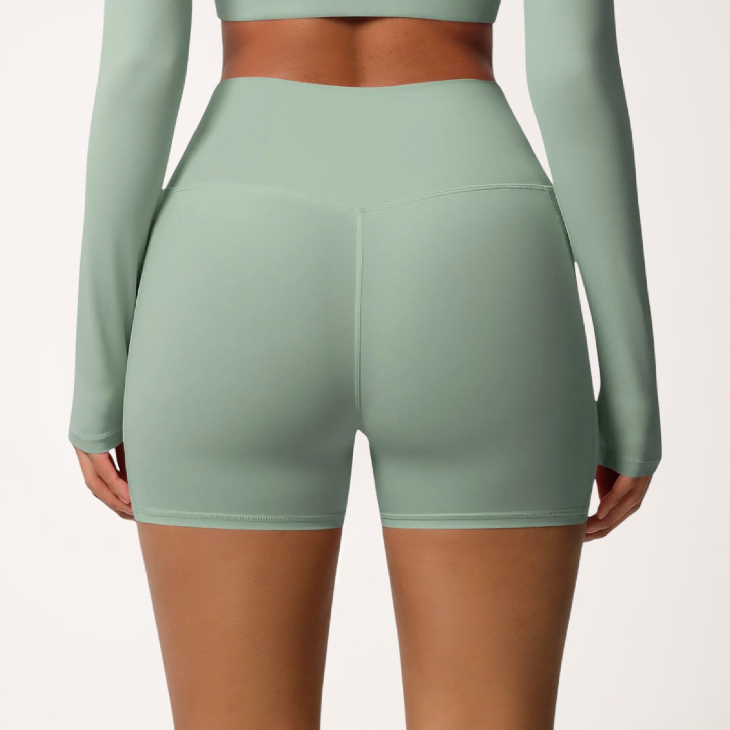 High Waist Active Shorts with Stretch Compression Fit Seamless Construction and Side Pocket Detail