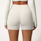 High Waist Active Shorts with Stretch Compression Fit Seamless Construction and Side Pocket Detail