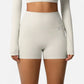 High Waist Active Shorts with Stretch Compression Fit Seamless Construction and Side Pocket Detail
