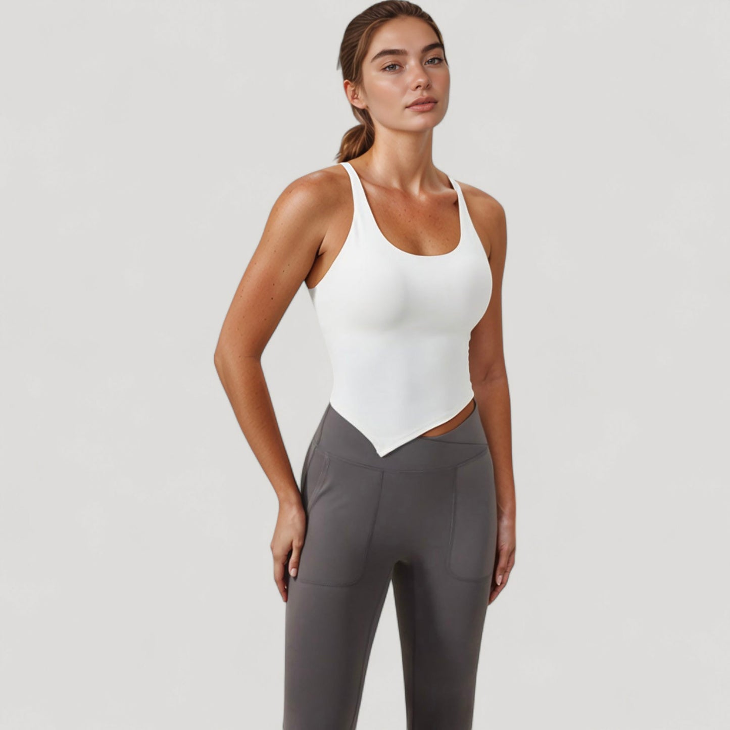 Scoop Neck Racerback Tank Top with Handkerchief Hem and Built-In Shelf Bra for Low Impact Activity
