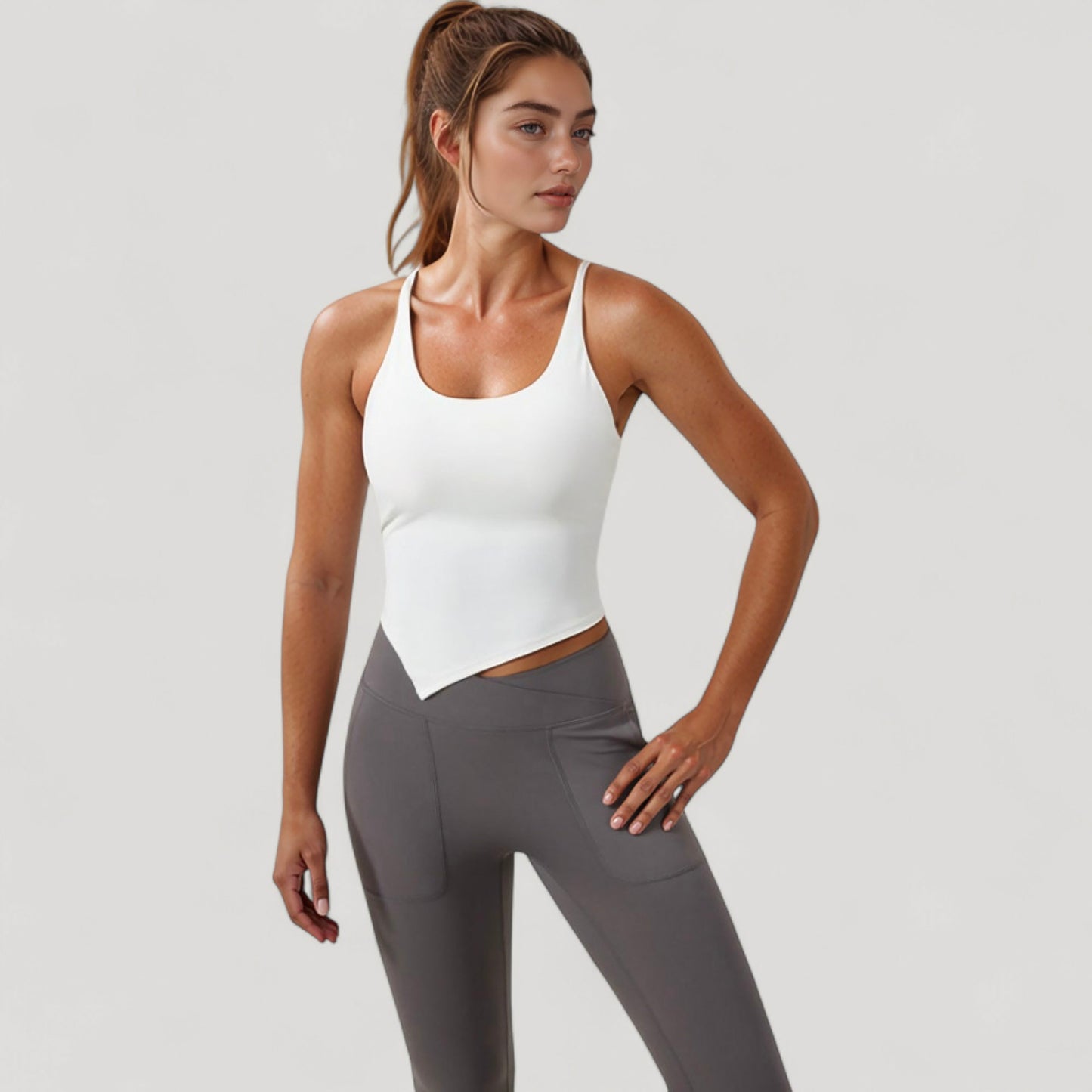 Scoop Neck Racerback Tank Top with Handkerchief Hem and Built-In Shelf Bra for Low Impact Activity