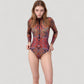 Long Sleeve One Piece Swimsuit with Tribal Inspired Print and Front Zipper Detail