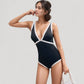 Contrast Trim One Piece Swimsuit with Deep V Neck and Waist-Defining Cut