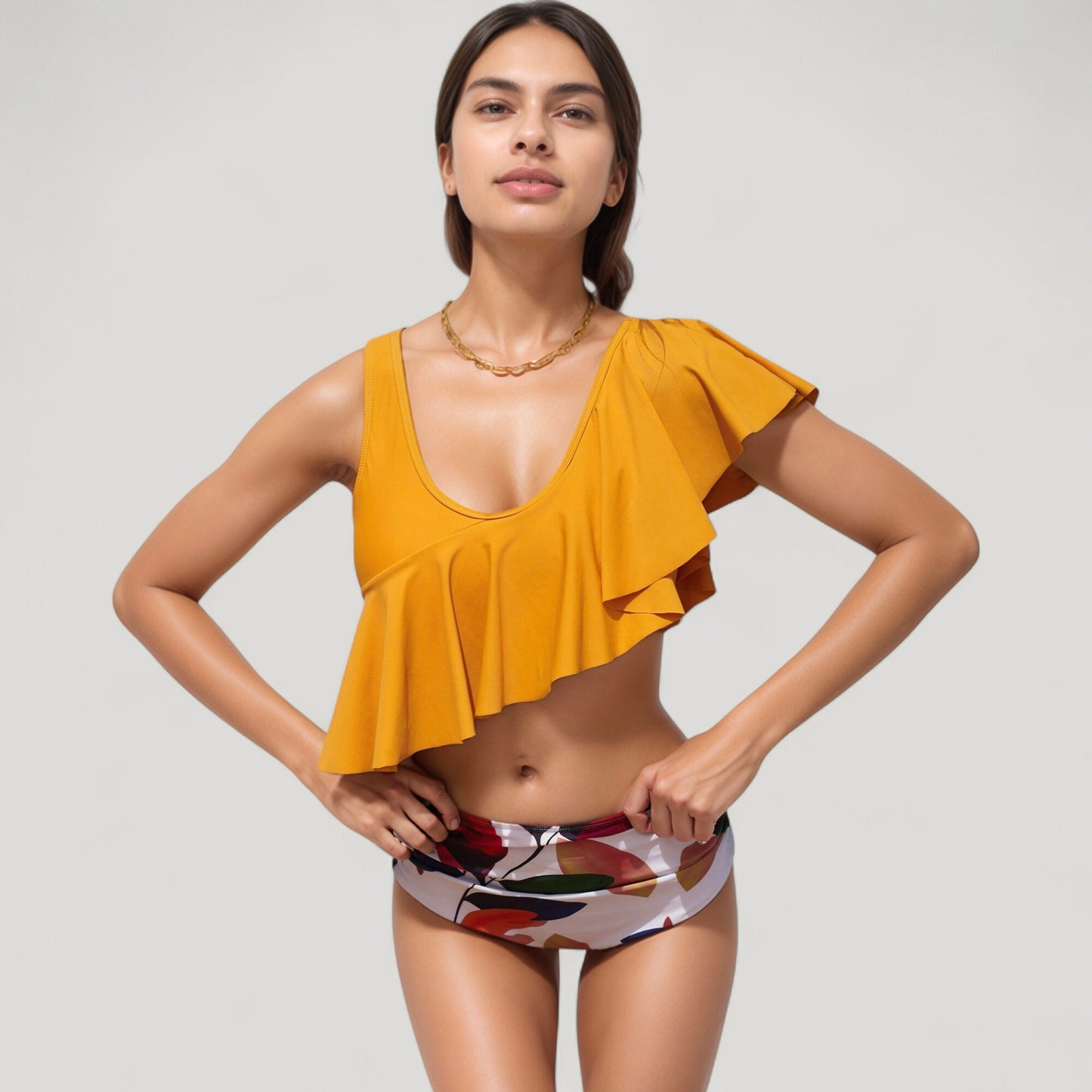 One Shoulder Ruffle Bikini Top with High Waist Abstract Print Bottom for a Bold and Flattering Swim Look