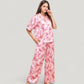 Satin Button-Up Pajama Set with Short Sleeve Notch Collar Top and Wide Leg Pants in Ribbon Print