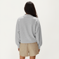 Long Sleeve Crew Neck Pullover Top with Relaxed Fit and Ribbed Cuffs