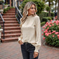 Long Sleeve Textured Blouse with Smocked High Neckline and Cuffed Sleeves