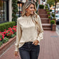 Long Sleeve Textured Blouse with Smocked High Neckline and Cuffed Sleeves