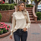 Long Sleeve Textured Blouse with Smocked High Neckline and Cuffed Sleeves