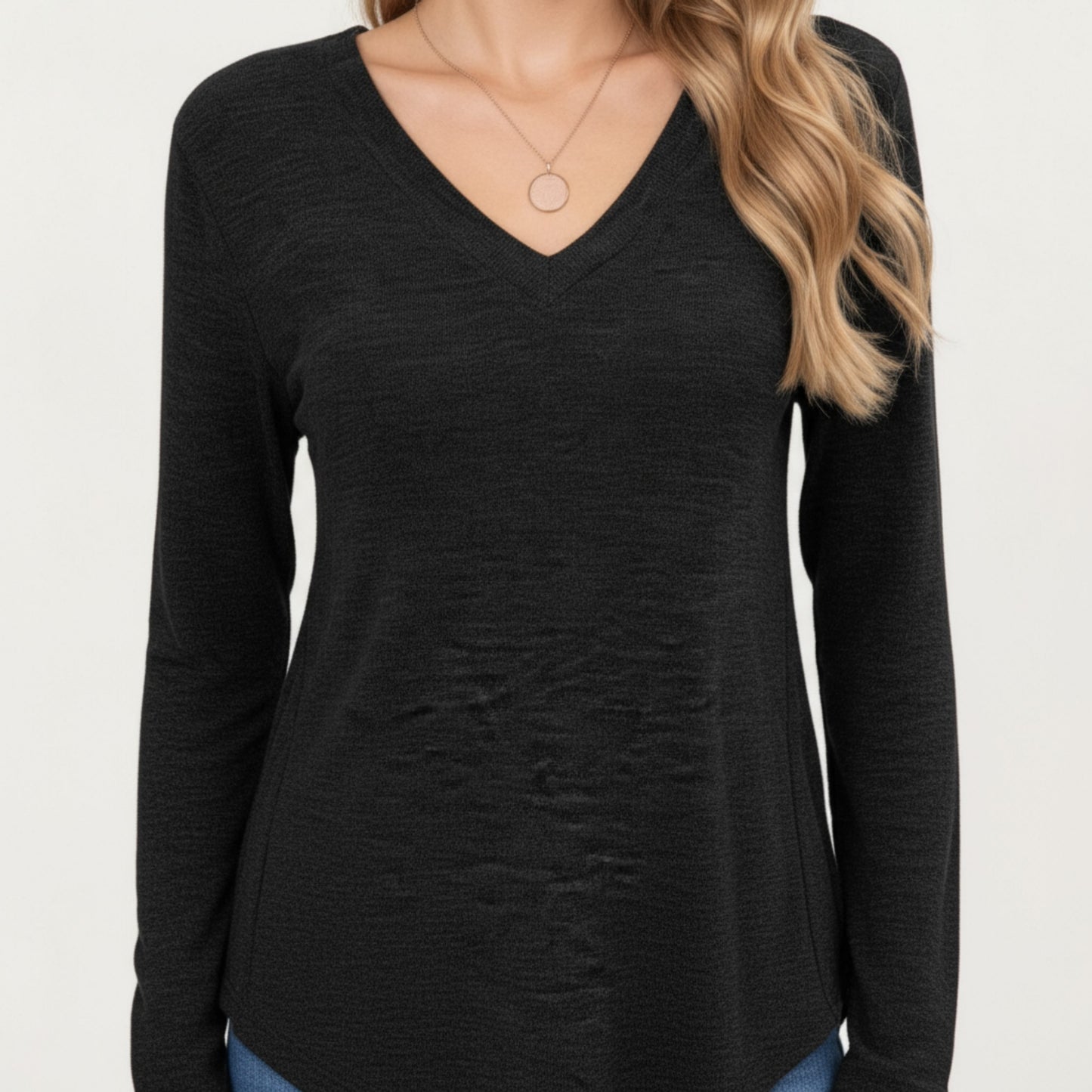 Long Sleeve V-Neck Knit Top with Curved Hem and Relaxed Fit