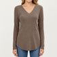 Long Sleeve V-Neck Knit Top with Curved Hem and Relaxed Fit