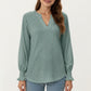 Long Sleeve Eyelet Embroidered Top with V-Neckline and Ruffle Cuffs