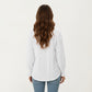 Long Sleeve Eyelet Embroidered Top with V-Neckline and Ruffle Cuffs
