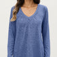 Long Sleeve V-Neck Top with Subtle Front Pleat and Relaxed Fit