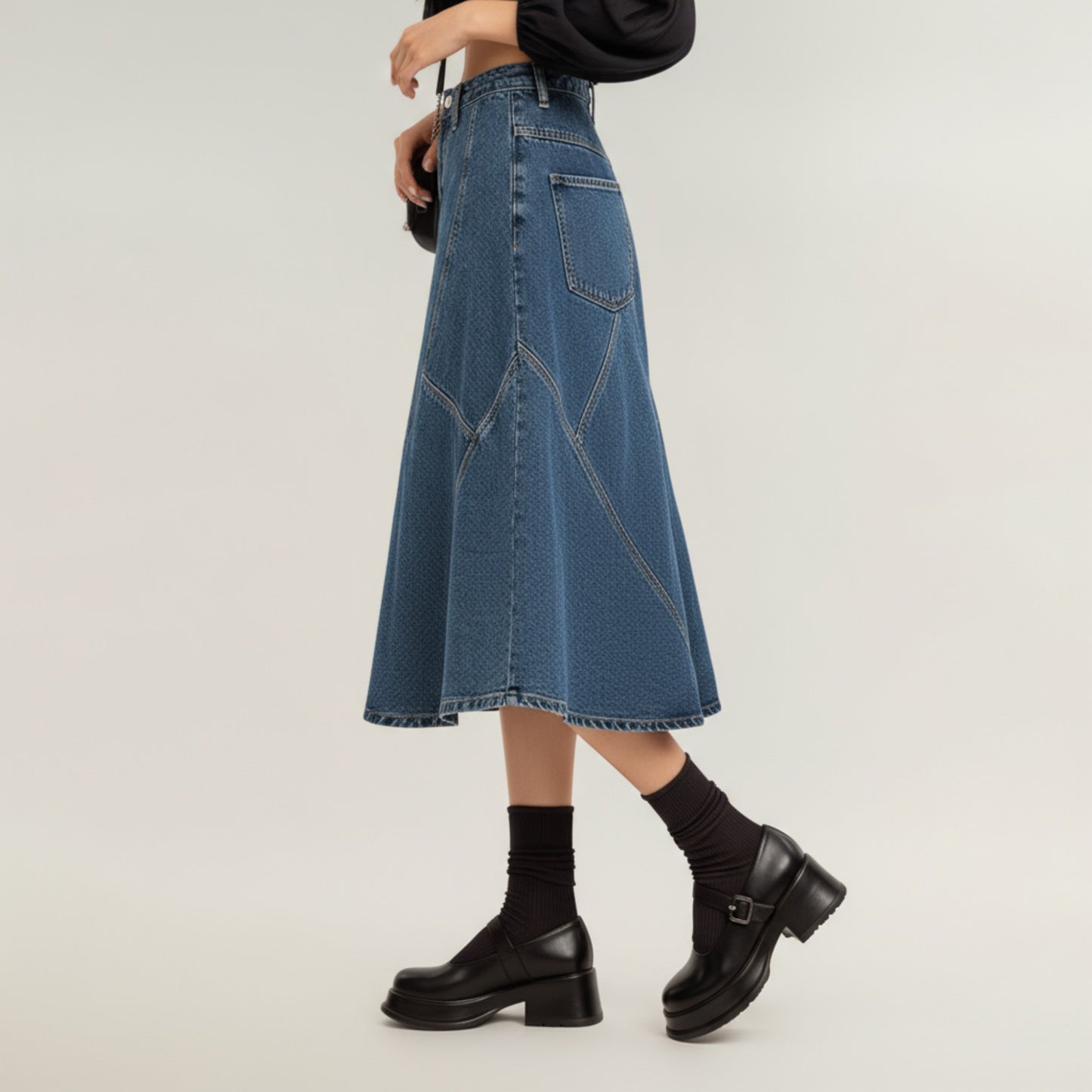 High Waist Denim Midi Skirt with Patchwork Seam Detailing and Flared Silhouette