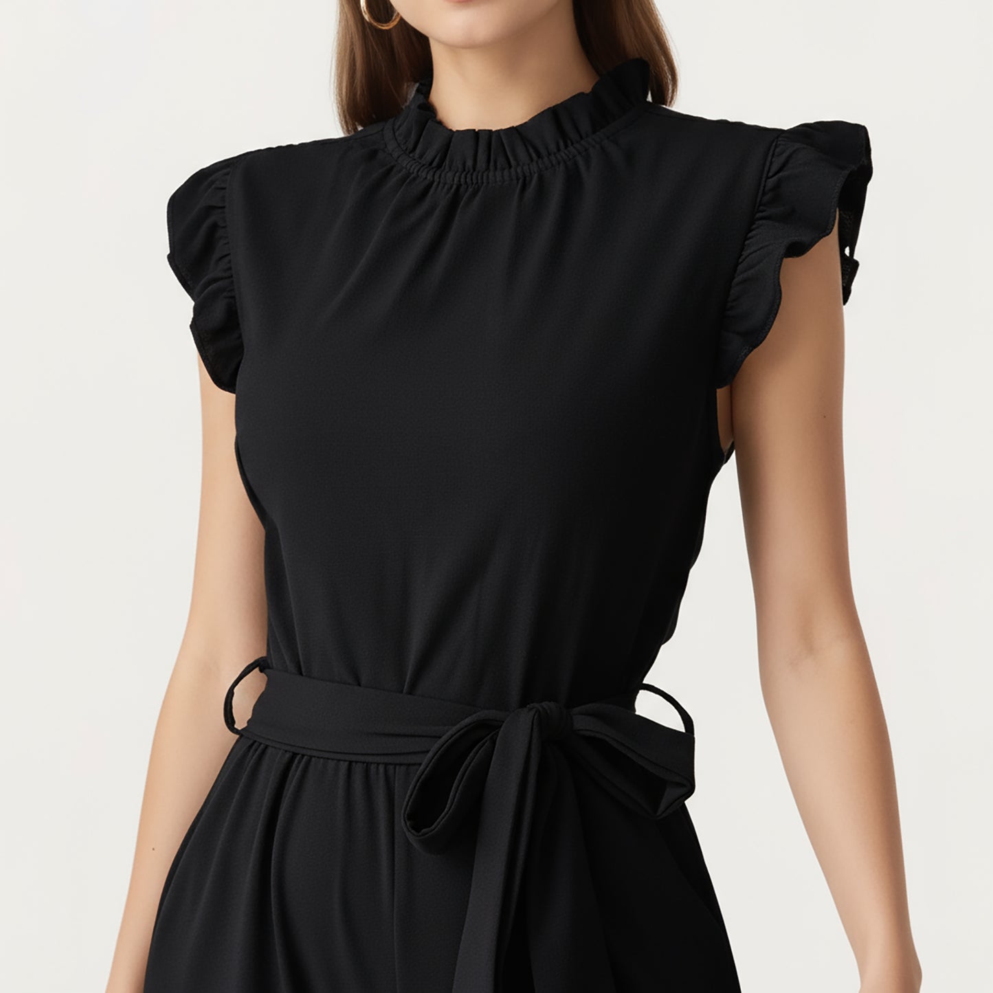 Ruffle Neck Sleeveless Wide Leg Jumpsuit with Soft Draped Waist Tie and Relaxed Flowing Silhouette
