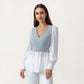 Long Sleeve Layered Top with Ribbed Knit Wrap Bodice, Structured Cuffs, and Flowy Buttoned Hem