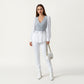 Long Sleeve Layered Top with Ribbed Knit Wrap Bodice, Structured Cuffs, and Flowy Buttoned Hem