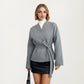 Wrap Front Belted Jacket with Soft Textured Fabric, Wide Sleeves, and Structured Peplum Shape