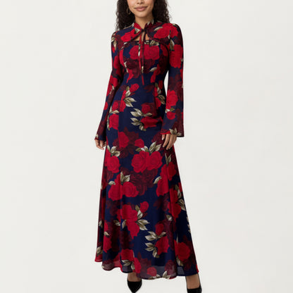 Floral Print Maxi Dress with Long Flared Sleeves, High Neckline, Front Tie Detail and Flowing A-Line Silhouette