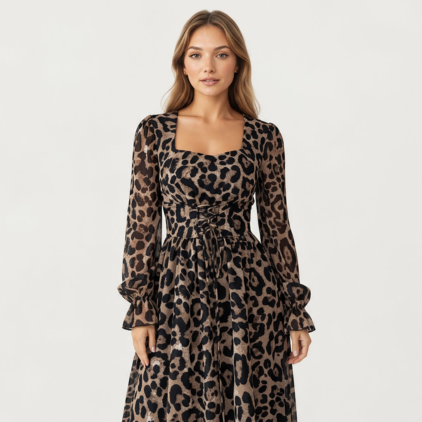 Leopard Print Maxi Dress with Square Neckline, Long Ruffled Cuff Sleeves and Fitted Waist Creating a Flowing A-Line Silhouette