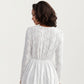 Long Sleeve Lace Mini Dress with V-Neckline and Sheer Waist Detail