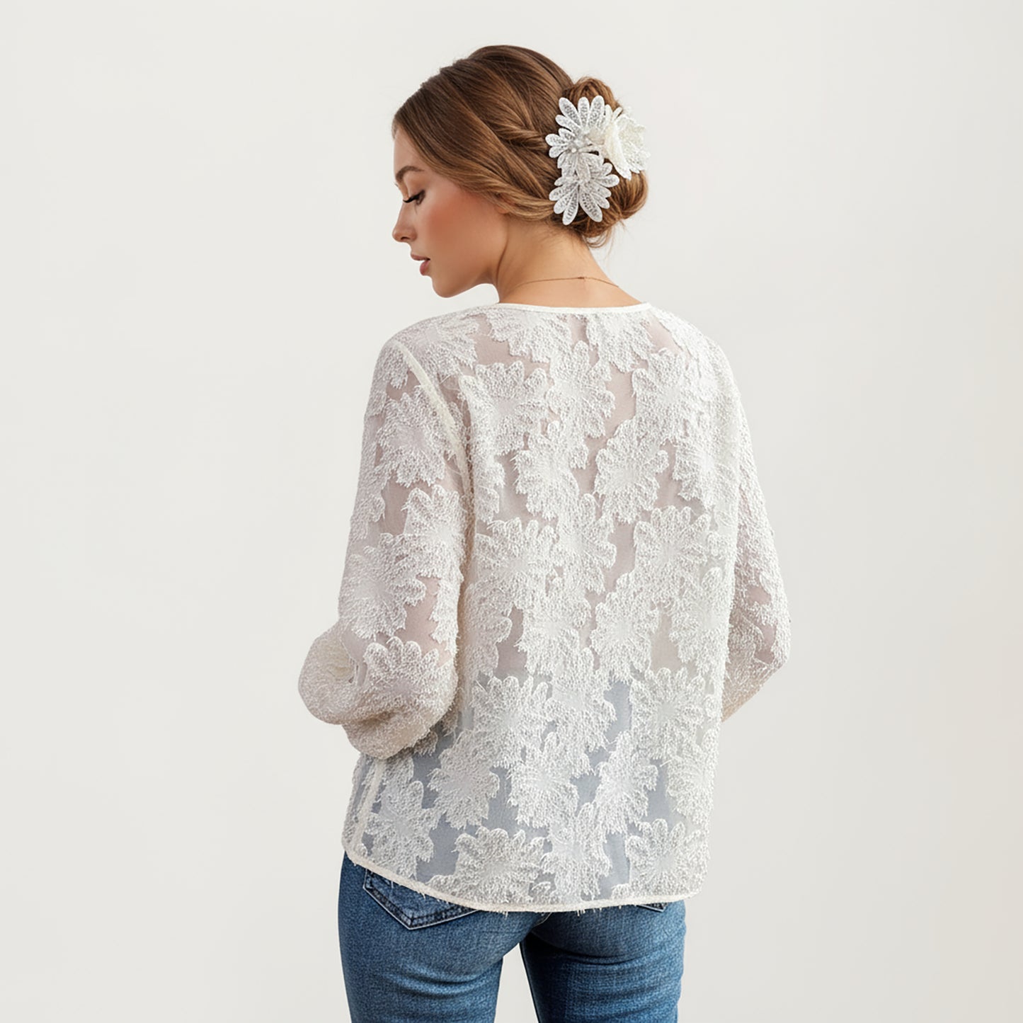 V-Neck Long Sleeve Lace Top with Smocked Cuffs and Textured Floral Pattern